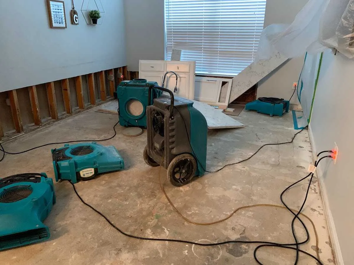 Dehumidifier in flood-cut room for Water Damage Restoration in Parma